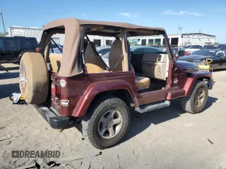 2001 Jeep Wrangler Sahara with VIN 1J4FA59S61P335016, listed as a Copart auction lot 83019614 with 0 mi miles and Salvage Title. Bid and sale history available at carsss.com. Image 3.