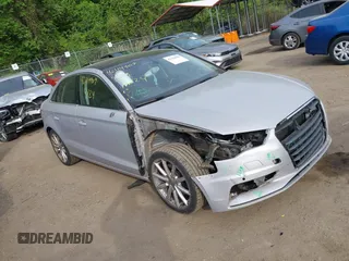 2015 Audi A3 Premium Plus z VIN WAUCCGFF3F1029677, wystawiony jako IAAI lot #42114909 z przebiegiem 126 182 mil mil oraz . Historia ofert i sprzedaży dostępna na DreamBid. Obrazek 1.