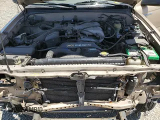1999 Toyota Tacoma PreRunner with VIN 4TASN92N7XZ573079, listed as a Copart auction lot 56917035 with 254,939 mi miles and Salvage title. Bid and sale history available at DreamBid. Image 11.