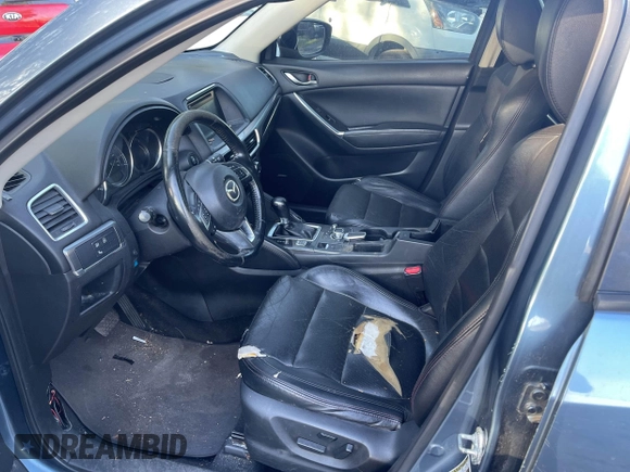 2016 Mazda CX-5 Grand Touring with VIN JM3KE4DY9G0673789, listed as a IAAI auction lot 42196841 with 98,622 mi miles and . Bid and sale history available at DreamBid. Image 5.