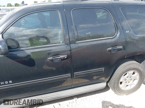 2012 Chevrolet Tahoe LT with VIN 1GNSKBE07CR161461, listed as a IAAI auction lot 42195737 with 210,890 mi miles and . Bid and sale history available at DreamBid. Image 14.