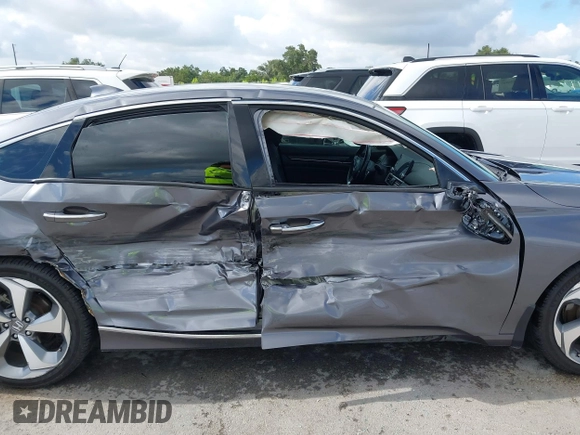 2020 Honda Accord Touring z VIN 1HGCV2F93LA023062, wystawiony jako IAAI lot #42596772 z przebiegiem 53 586 mil mil oraz . Historia ofert i sprzedaży dostępna na DreamBid. Obrazek 13.