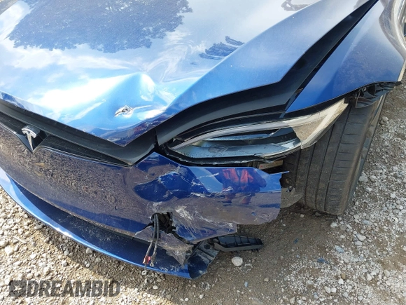 2022 Tesla Model S with VIN 5YJSA1E55NF486443, listed as a IAAI auction lot 42720110 with Not provided miles and . Bid and sale history available at DreamBid. Image 22.