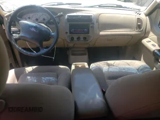 2004 Ford Explorer Sport Trac XLS z VIN 1FMZU67K34UC40112, wystawiony jako Copart lot #57877855 z przebiegiem 139 350 mil mil oraz Szkoda całkowita • Salvage title. Historia ofert i sprzedaży dostępna na DreamBid. Obrazek 8.