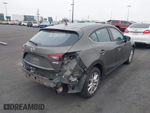 2015 Mazda 3 i Touring with VIN JM1BM1L7XF1261134, listed as a IAAI auction lot 42164554 with 130,570 mi miles and . Bid and sale history available at DreamBid. Image 4.