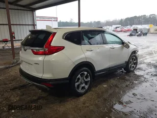 2019 Honda CR-V EX with VIN 2HKRW2H56KH641449, listed as a IAAI auction lot 41762860 with 181,557 mi miles and . Bid and sale history available at DreamBid. Image 4.
