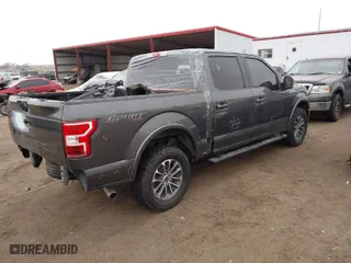 2018 Ford F-150 XL with VIN 1FTEW1EG1JKF75729, listed as a IAAI auction lot 41532591 with 105,714 mi miles. Bid and sale history available at carsss.com. Image 4.