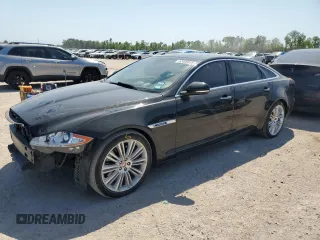 2014 Jaguar XJ with VIN SAJWA2GTXEMV61973, listed as a Copart auction lot 52406035 with 94,334 mi miles and Salvage title. Bid and sale history available at DreamBid. Image 1.