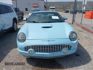 2003 Ford Thunderbird Deluxe z VIN 1FAHP60A53Y101461, wystawiony jako IAAI lot #42519933 z przebiegiem 64 820 mil mil oraz . Historia ofert i sprzedaży dostępna na DreamBid. Obrazek 12.