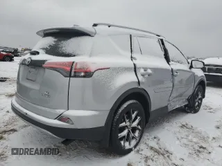 2017 Toyota RAV4 SE z VIN JTMJJREV2HD077614, wystawiony jako Copart lot #87924205 z przebiegiem 92 896 mil mil oraz Szkoda całkowita • Salvage title. Historia ofert i sprzedaży dostępna na DreamBid. Obrazek 3.