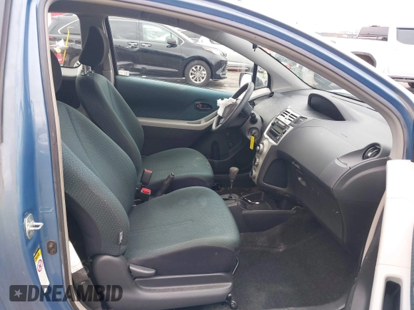 2007 Toyota Yaris z VIN JTDJT903375113576, wystawiony jako IAAI lot #41599408 z przebiegiem 192 543 mil mil oraz . Historia ofert i sprzedaży dostępna na DreamBid. Obrazek 5.
