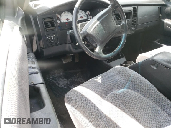2003 Dodge Dakota с VIN 1D7GL72Z63S140501, выставлен на аукционе Copart как лот 52825824 с пробегом 188 913 миль миль и Списание • Salvage title. История ставок и продаж доступна на DreamBid. Изображение 8.