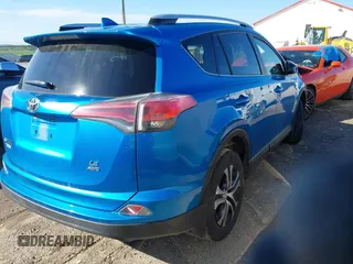 2016 Toyota RAV4 LE with VIN JTMBFREV2GD183811, listed as a IAAI auction lot 42216793 with 95,270 mi miles and . Bid and sale history available at DreamBid. Image 4.