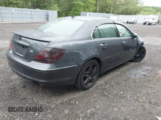 2005 Acura RL z VIN JH4KB16555C004884, wystawiony jako IAAI lot #42295358 z przebiegiem 233 438 mil mil oraz . Historia ofert i sprzedaży dostępna na DreamBid. Obrazek 4.