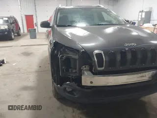 2014 Jeep Cherokee Altitude with VIN 1C4PJMCB2EW317346, listed as a IAAI auction lot 41861651 with 100,602 mi miles. Bid and sale history available at carsss.com. Image 6.