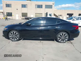 2016 Nissan Maxima SL with VIN 1N4AA6AP9GC448087, listed as a IAAI auction lot 41828781 with 99,436 mi miles and . Bid and sale history available at DreamBid. Image 14.