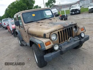 1999 Jeep Wrangler Sport with VIN 1J4FY19S0XP430555, listed as a IAAI auction lot 42434848 with Not provided miles and . Bid and sale history available at DreamBid. Image 1.