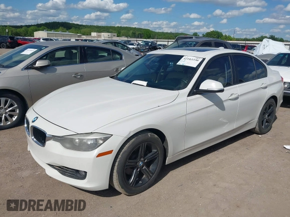 2014 BMW 3 Series 328i with VIN WBA3A5C5XEJ463938, listed as a IAAI auction lot 42103330 with 194,263 mi miles and . Bid and sale history available at DreamBid. Image 6.