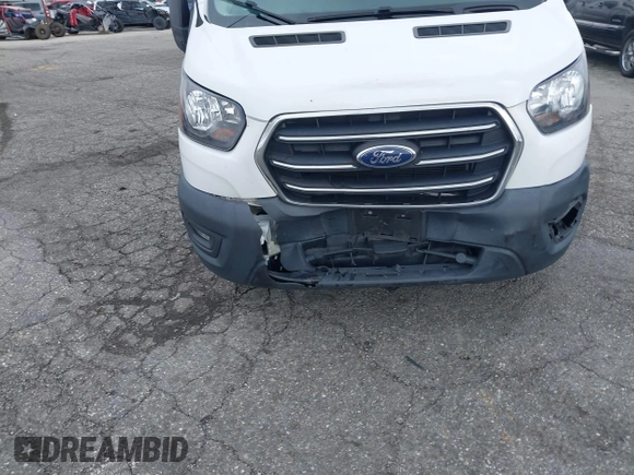 2020 Ford Transit Cargo with VIN 1FTBR1C82LKB36256, listed as a IAAI auction lot 41464921 with 111,024 mi miles and . Bid and sale history available at DreamBid. Image 6.