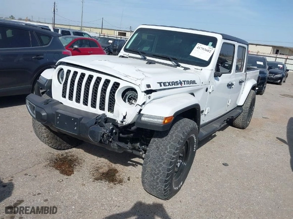 2023 Jeep Gladiator Sport S with VIN 1C6HJTAG9PL547796, listed as a IAAI auction lot 41793602 with 32,721 mi miles. Bid and sale history available at carsss.com. Image 2.