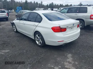 2015 BMW 3 Series 328i xDrive with VIN WBA3B5G50FNS15117, listed as a IAAI auction lot 41843496 with 144,613 mi miles. Bid and sale history available at carsss.com. Image 3.