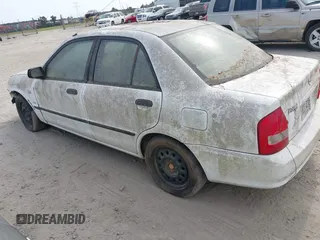 2003 Mazda Protege DX with VIN JM1BJ225730146488, listed as a IAAI auction lot 42086747 with Not Provided miles and . Bid and sale history available at DreamBid. Image 3.