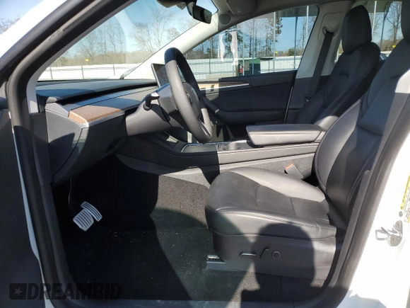 2023 Tesla Model Y Performance with VIN 7SAYGDEF4PF665873, listed as a Copart auction lot 49620705 with 39,239 mi miles and Salvage Title. Bid and sale history available at DreamBid. Image 7.