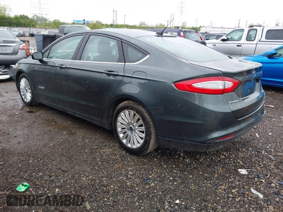 2015 Ford Fusion SE Hybrid with VIN 3FA6P0LU9FR184907, listed as a IAAI auction lot 42119737 with 153,255 mi miles and . Bid and sale history available at DreamBid. Image 3.