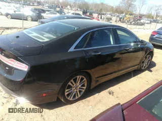 2013 Lincoln MKZ z VIN 3LN6L2GK3DR812737, wystawiony jako IAAI lot #41863501 z przebiegiem 202 152 mil mil oraz . Historia ofert i sprzedaży dostępna na DreamBid. Obrazek 4.