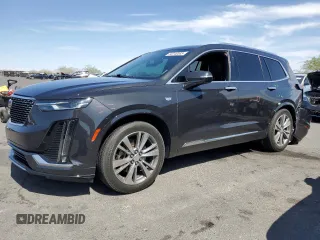 2020 Cadillac XT6 FWD Premium Luxury z VIN 1GYKPCRS9LZ126510, wystawiony jako Copart lot #58240585 z przebiegiem 57 156 mil mil oraz Szkoda całkowita • Salvage title. Historia ofert i sprzedaży dostępna na DreamBid. Obrazek 1.