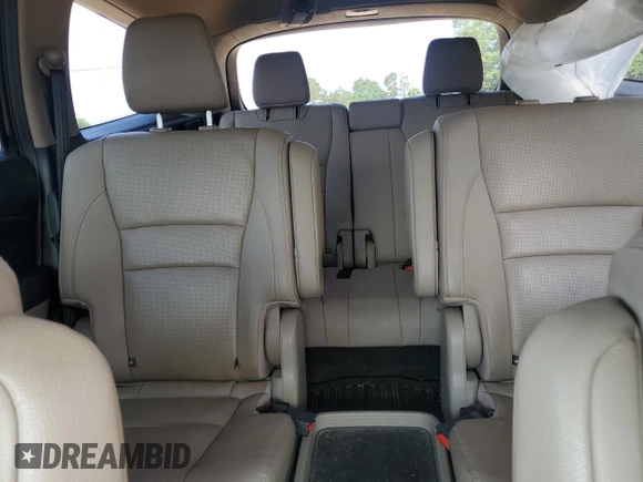 2018 Honda Pilot Elite with VIN 5FNYF6H03JB019900, listed as a Copart auction lot 57497235 with 60,358 mi miles and Salvage title. Bid and sale history available at DreamBid. Image 10.