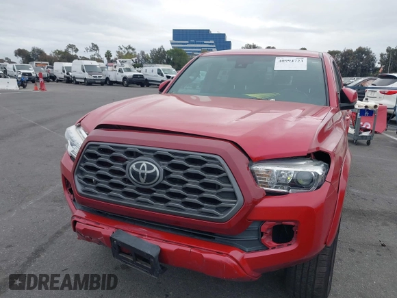 2020 Toyota Tacoma SR5 z VIN 3TMAZ5CN1LM139635, wystawiony jako IAAI lot #40994723 z przebiegiem 72 752 mil mil oraz . Historia ofert i sprzedaży dostępna na DreamBid. Obrazek 6.