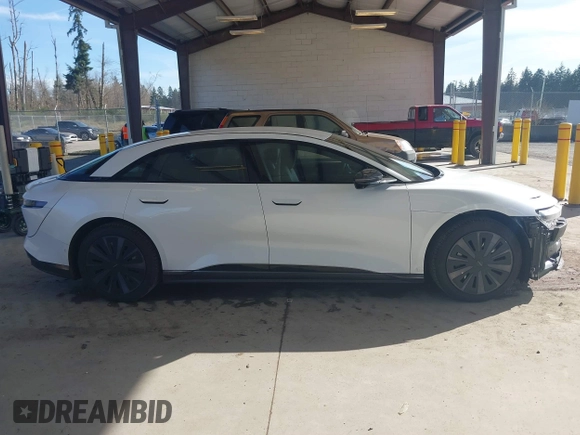 2024 Lucid Air Pure with VIN 50EA1PGA1RA007535, listed as a IAAI auction lot 41879547 with 2,497 mi miles. Bid and sale history available at carsss.com. Image 14.