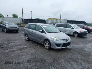 2010 Mazda 5 Sport with VIN JM1CR2WL9A0375192, listed as a IAAI auction lot 42621634 with 130,076 mi miles and . Bid and sale history available at DreamBid. Image 1.