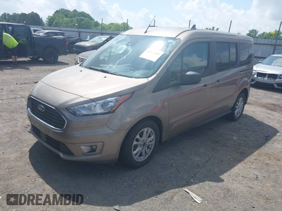 2020 Ford Transit Connect XLT with VIN NM0GE9F25L1456908, listed as a IAAI auction lot 42136585 with 55,163 mi miles and . Bid and sale history available at DreamBid. Image 2.