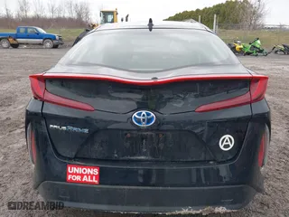2021 Toyota Prius Prime LE with VIN JTDKAMFP2M3165859, listed as a IAAI auction lot 41943098 with 20,306 mi miles. Bid and sale history available at carsss.com. Image 17.