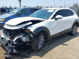 2021 Mazda CX-30 Select with VIN 3MVDMBBL9MM313039, listed as a IAAI auction lot 42575424 with 21,083 mi miles and . Bid and sale history available at DreamBid. Image 17.