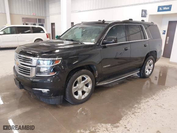 2015 Chevrolet Tahoe LTZ with VIN 1GNSKCKC4FR243964, listed as a IAAI auction lot 41558348 with 137,444 mi miles. Bid and sale history available at carsss.com. Image 17.
