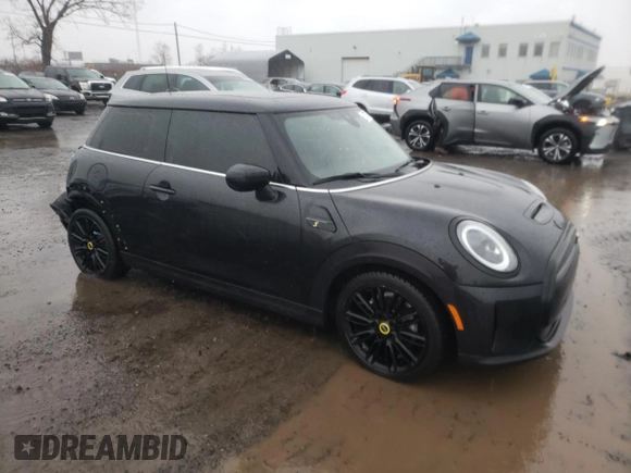 2023 MINI Hardtop Cooper SE z VIN WMW13DJ04P2U22804, wystawiony jako Copart lot #51372015 z przebiegiem 30 903 mil mil oraz Szkoda całkowita • Salvage title. Historia ofert i sprzedaży dostępna na DreamBid. Obrazek 4.