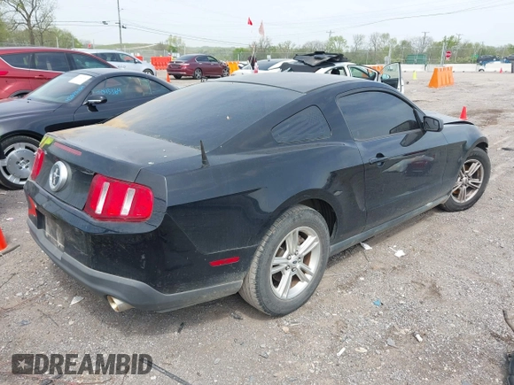 2012 Ford Mustang V6 Premium with VIN 1ZVBP8AM3C5274138, listed as a IAAI auction lot 42060091 with 228,384 mi miles. Bid and sale history available at carsss.com. Image 4.