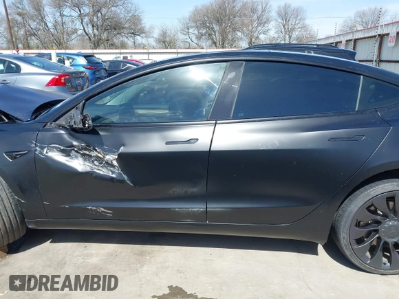 2022 Tesla Model 3 Performance with VIN 5YJ3E1EC6NF104475, listed as a IAAI auction lot 41734724 with 31,717 mi miles and . Bid and sale history available at carsss.com. Image 14.