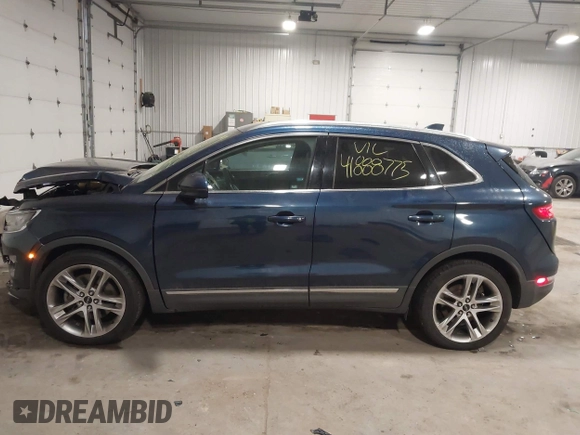 2015 Lincoln MKC with VIN 5LMTJ2AH0FUJ28744, listed as a IAAI auction lot 41888775 with 145,872 mi miles. Bid and sale history available at carsss.com. Image 14.