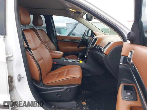 2013 Jeep Grand Cherokee Overland with VIN 1C4RJFCT4DC640553, listed as a IAAI auction lot 41311413 with 146,212 mi miles. Bid and sale history available at carsss.com. Image 5.
