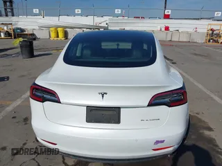 2019 Tesla Model 3 Long Range with VIN 5YJ3E1EB1KF510912, listed as a IAAI auction lot 41857775 with Not Provided miles and . Bid and sale history available at DreamBid. Image 16.
