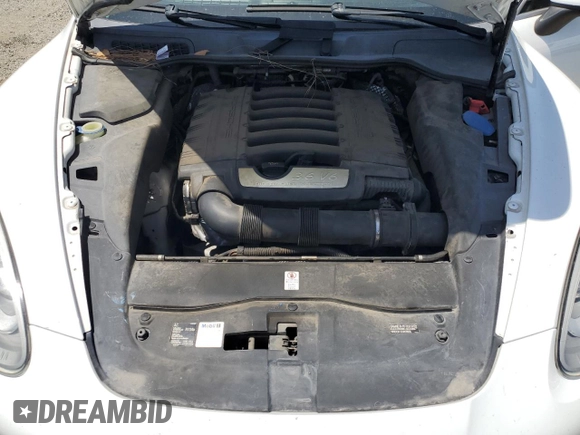 2014 Porsche Cayenne with VIN WP1AA2A28ELA09742, listed as a Copart auction lot 61779285 with 182,380 mi miles and Salvage title. Bid and sale history available at DreamBid. Image 12.