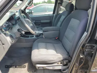 2005 Ford Explorer Sport Trac XLS with VIN 1FMZU67K65UA29830, listed as a Copart auction lot 54941185 with 214,220 mi miles and Salvage title. Bid and sale history available at DreamBid. Image 7.