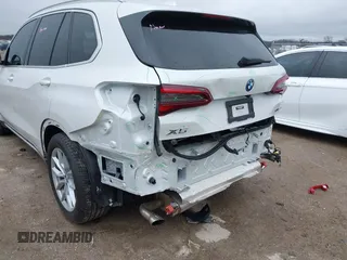 2023 BMW X5 xDrive45e with VIN 5UXTA6C02P9R94549, listed as a IAAI auction lot 41534725 with 8,698 mi miles. Bid and sale history available at carsss.com. Image 6.