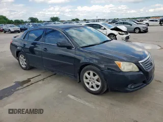 2010 Toyota Avalon XL with VIN 4T1BK3DB2AU360201, listed as a Copart auction lot 54443575 with 220,759 mi miles and Clean Title. Bid and sale history available at carsss.com. Image 4.
