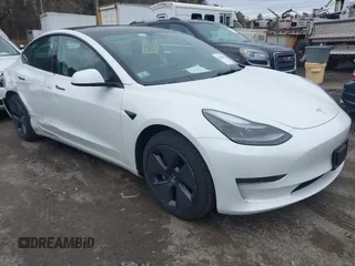 2023 Tesla Model 3 with VIN 5YJ3E1EA2PF475070, listed as a IAAI auction lot 41948023 with 61,178 mi miles and . Bid and sale history available at DreamBid. Image 1.