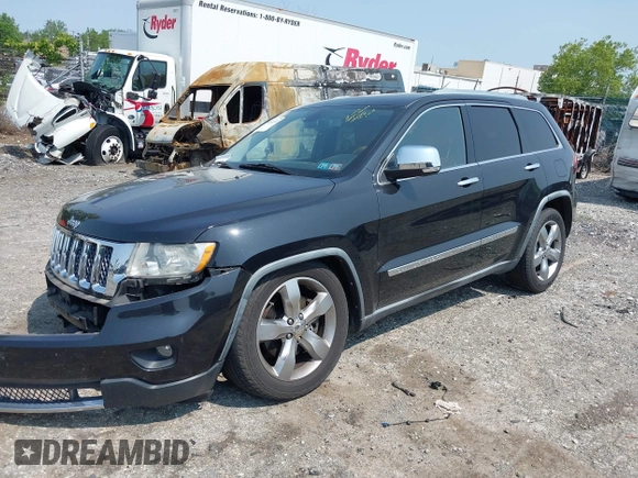 2011 Jeep Grand Cherokee Overland with VIN 1J4RR6GT3BC574037, listed as a IAAI auction lot 42411532 with 158,765 mi miles and . Bid and sale history available at DreamBid. Image 2.